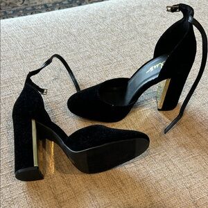 Lulu's Black Velvet Heels with Gold Accents. Never been worn.